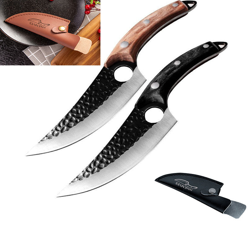 Set of two curved butcher knives with hammered black blades, one with a wooden handle and one with a black handle, plus a.