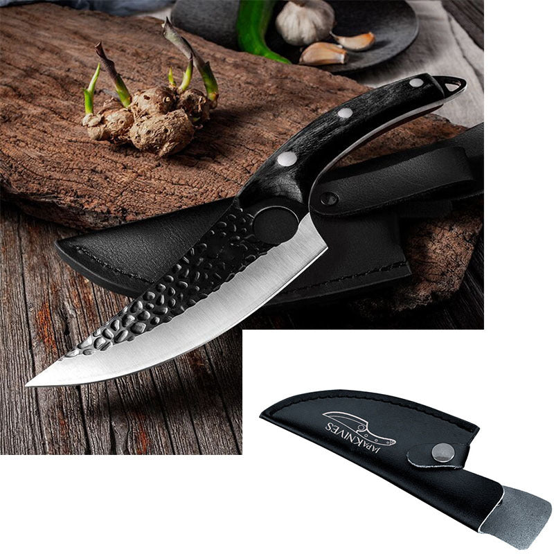 Curved butcher knife with hammered blade and black textured handle, displayed with black sheath on wood surface.
