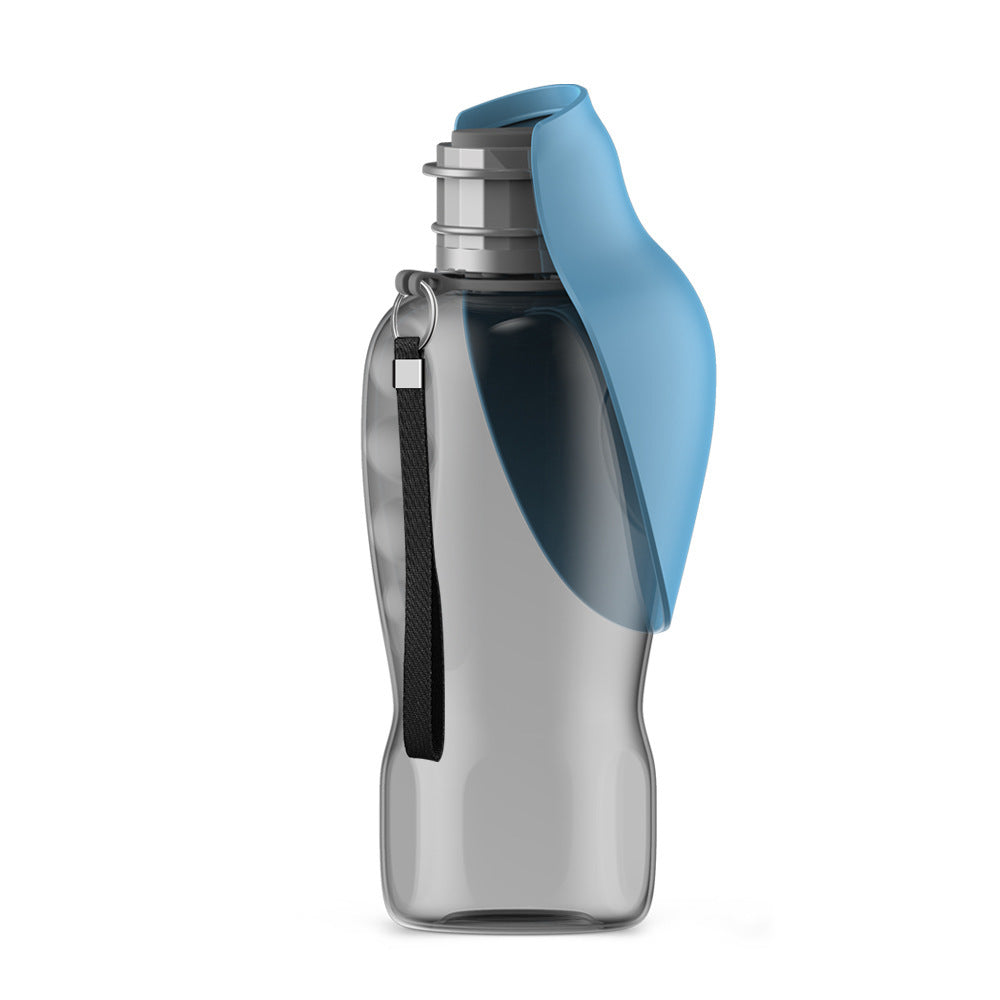 Gray portable pet water bottle with attached blue foldable drinking bowl and black strap.