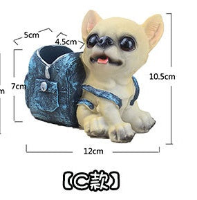 Small beige puppy figurine wearing blue overalls with a denim texture and pocket, measuring 12cm long and 10.5cm tall.