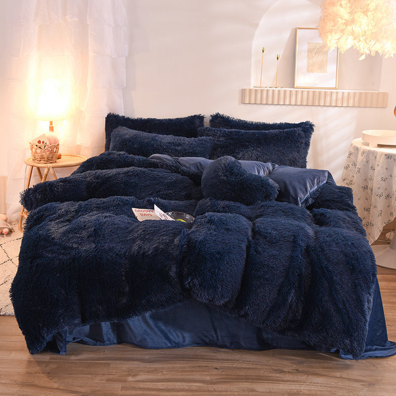 Plush navy blue thick fleece duvet cover with matching pillowcases on bed in cozy room setting.