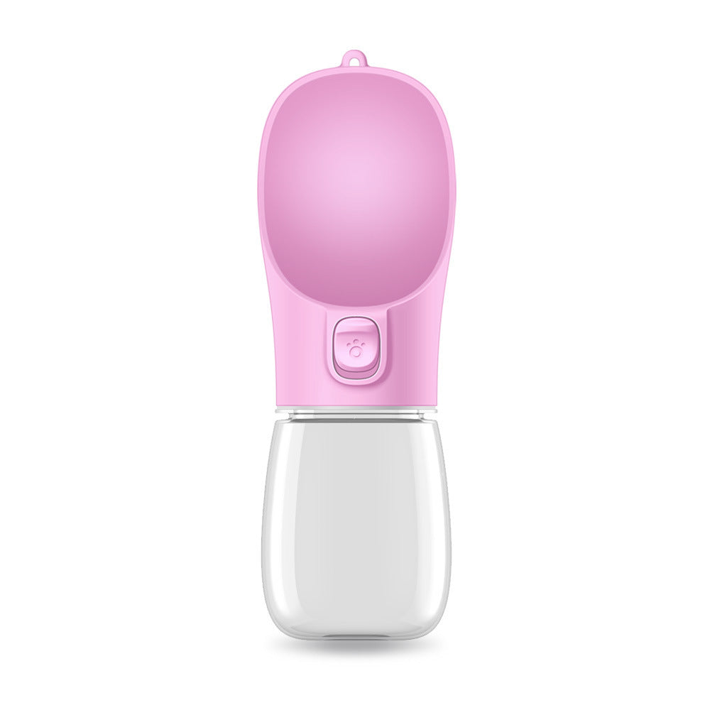 Pink portable dog water bottle with foldable drinking bowl and push-button release.