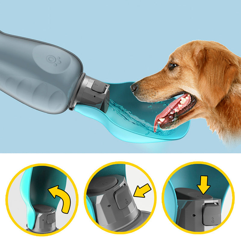 Blue portable dog water bottle with attached foldable drinking bowl being used by a golden retriever against a blue.