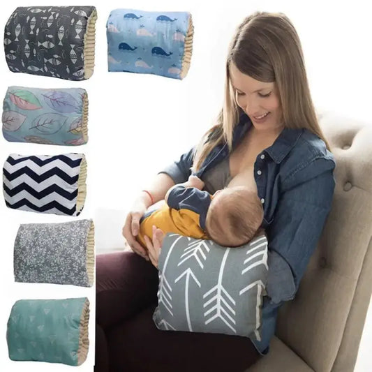 Gray nursing pillow with white arrow patterns, cotton fabric, curved U-shape designed for breastfeeding support.