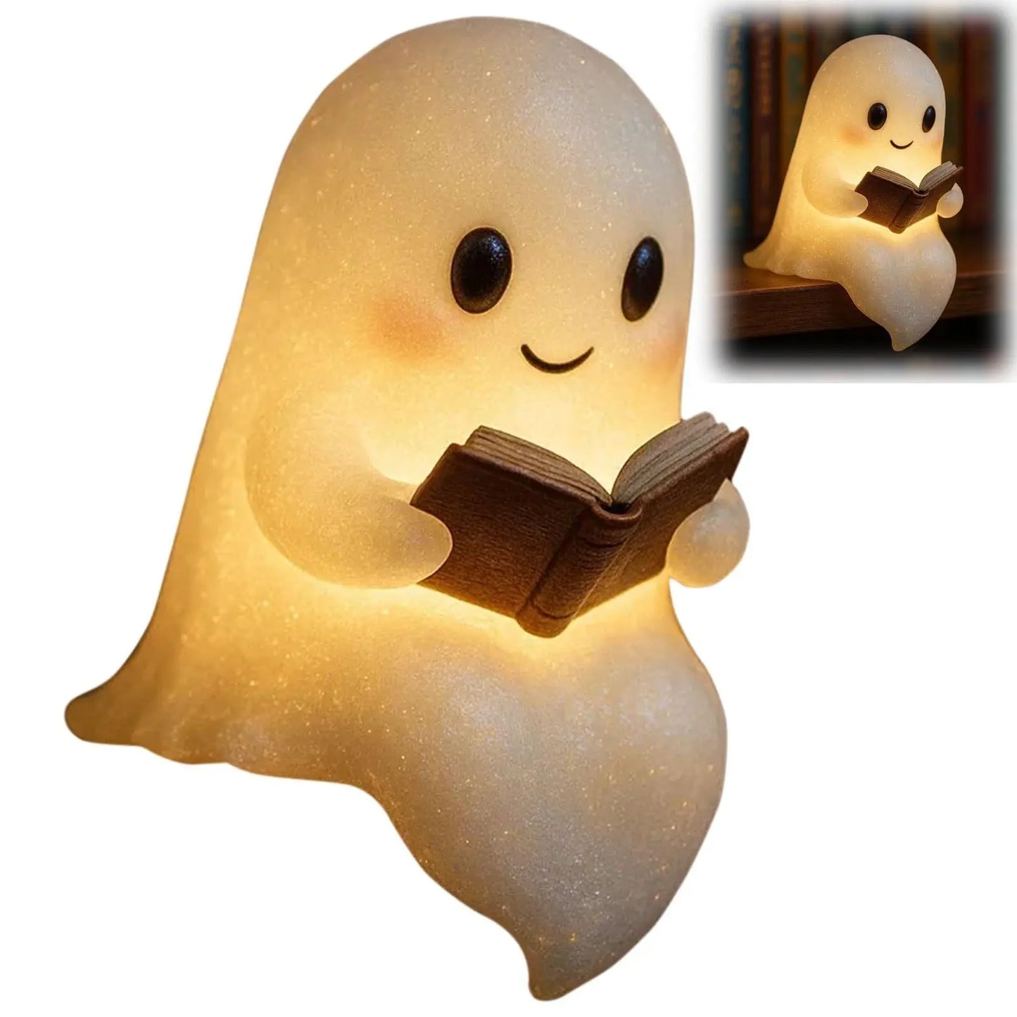 Glowing white ghost-shaped night light holding an open book with a smiling face and warm light glow.